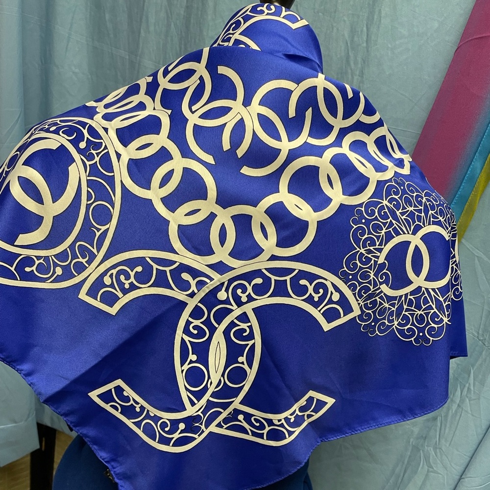 Gorgeous blue and white 100% authentic silk scarf.